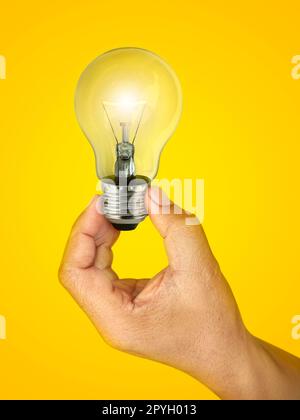 Concept creativity with Hand holding glowing light bulb  that sh Stock Photo