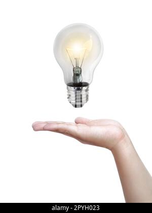 Light bulb in hand,Realistic photo image. Turn on tungsten light bulb with hand, isolated on white background Stock Photo