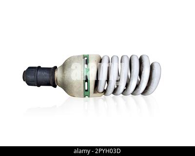 Old technology and wasting electricity, burned out light bulb Stock Photo