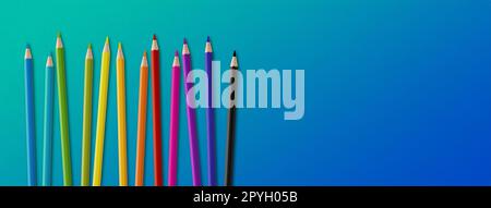 Colored pencil group isolated on blue. Panoramic banner background Stock Photo