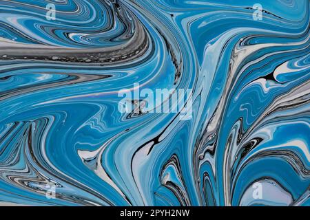 Colorful swirls of blue paint. Abstract background. Stock Photo