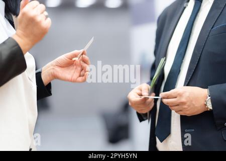 Business people exchanging business card on business meeting, Business discussion talking deal concept Stock Photo
