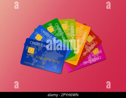 Colorful credit cards isolated on a pink background Stock Photo