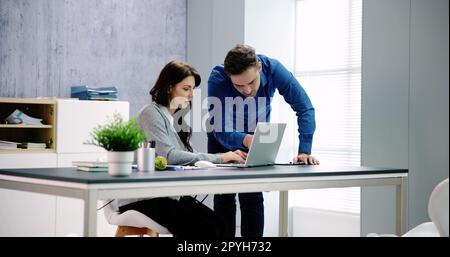 Business People Training On Computer. Stock Photo