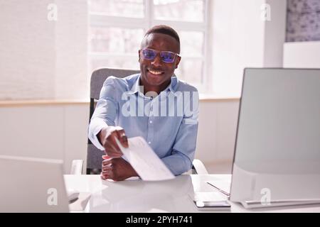 Payroll Cheque. Giving Paycheck Compensation Stock Photo