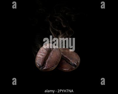 Coffee bean. with smoke on black background Stock Photo