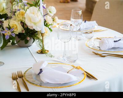 Luxury elegant wedding reception table arrangement and floral centerpiece - wedding banquet and event outdoor Stock Photo