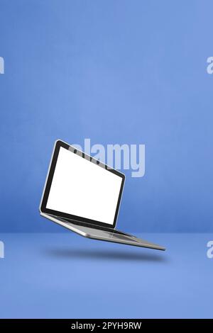 Blank computer laptop floating over a blue background. 3D isolated illustration. Vertical template Stock Photo