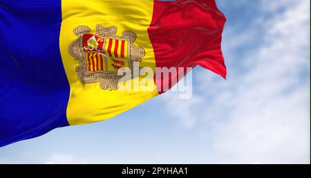 The flag of the Principality of Andorra waving in the wind on a clear day Stock Photo