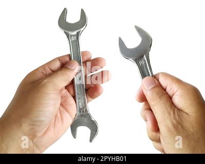 hand holding Adjustable spanner or adjustable wrench isolated on white background Stock Photo