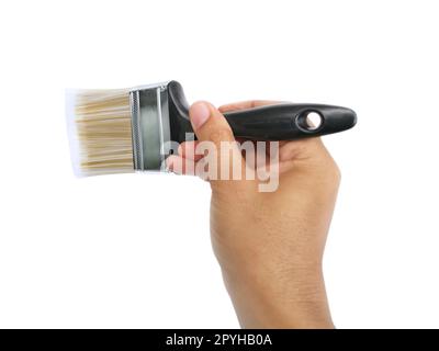 hand holding Paintbrush isolated on white background Stock Photo