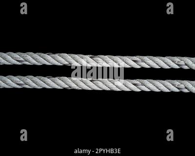 Old Ropes on a black background Stock Photo