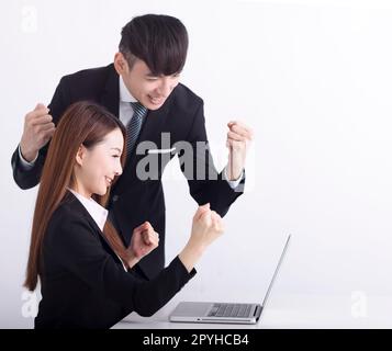 Business  team using laptop and working together in office Stock Photo