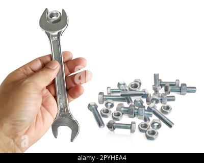chrome spanner with nut and bolt Stock Photo