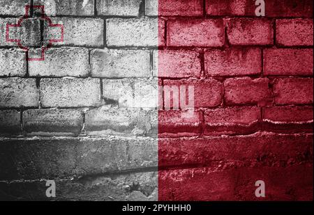 Dark brick wall with the flag Stock Photo