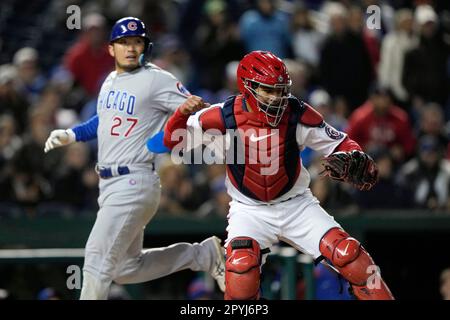 Chicago Cubs' Seiya Suzuki, of Japan, adjusts his hat as he pauses in the  dugout prior to a baseball game against the Arizona Diamondbacks Sunday,  May 15, 2022, in Phoenix. (AP Photo/Ross