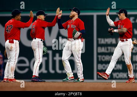 Boston Red Sox players, from left, Enmanuel Valdez, Enrique