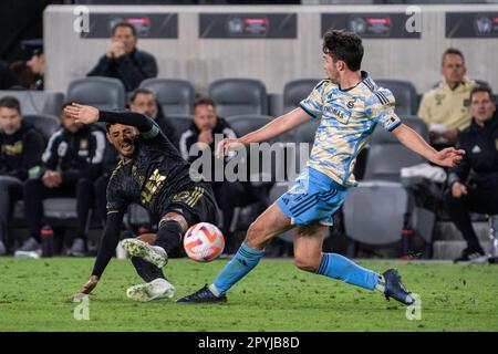 Philadelphia Union midfielder Leon Flach (31) is fouled by LAFC forward Carlos Vela (10) during a CONCACAF Champions League semi-final match, Tuesday, Stock Photo