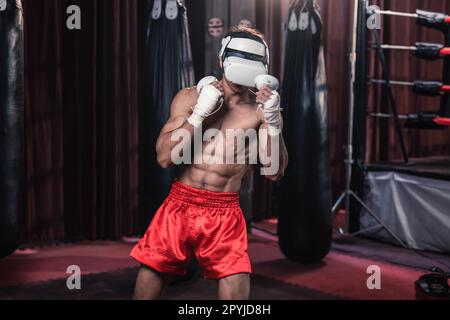 Professional boxer wear virtual reality headsets to engage in immersive boxing workouts simulations while practicing their punching techniques. Live, Stock Photo