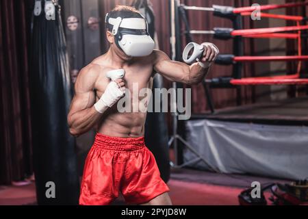 Professional boxer wear virtual reality headsets to engage in immersive boxing workouts simulations while practicing their punching techniques. Live, Stock Photo