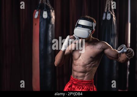 Professional boxer wear virtual reality headsets to engage in immersive boxing workouts simulations while practicing their punching techniques. Live, Stock Photo