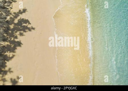 aerial view with drone ,of waves on tropical white sand beach Stock Photo