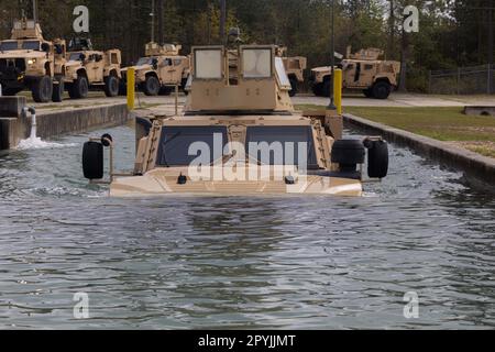 North Carolina, USA. 4th Apr, 2023. U.S. Marines 6th Marine Regiment, 2d Marine Division conduct a fording operation during the Light Tactical Family (LTF) Crew Maneuver Course on Camp Johnson, North Carolina, April 4, 2023. The five-day course focused on training and educating crew members on effective LTF employment in rough terrains. (photo by Joshua Kumakaw) Credit: U.S. Marines/ZUMA Press Wire Service/ZUMAPRESS.com/Alamy Live News