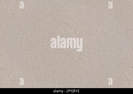 Beige color cardboard recycled paper, seamless tileable texture, image width 20cm Stock Photo