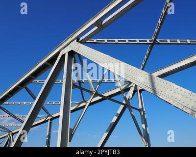 The bridge on the river Sava. Part of the construction of the metal iron bridge. Modern technological beams Stock Photo