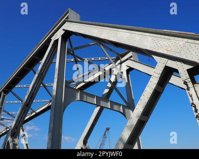 The bridge on the river Sava. Part of the construction of the metal iron bridge. Modern technological beams Stock Photo