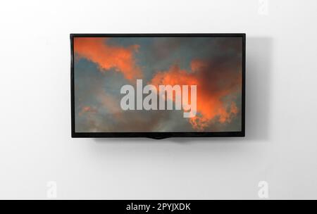 TV monitor with picture on the wall Stock Photo