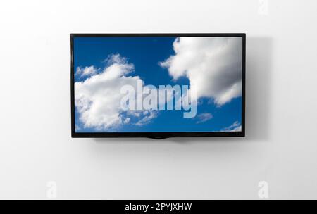 TV monitor with picture on the wall Stock Photo