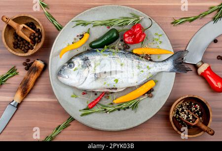 Raw sea bream or dorada fish Stock Photo