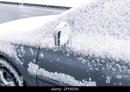 The car is a completely covered snow Stock Photo