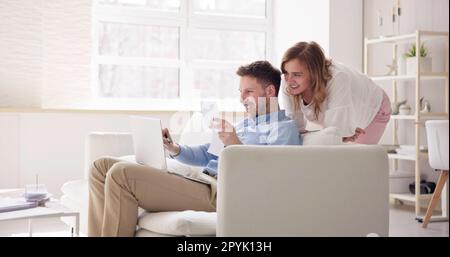 Portrait Of Couple Doing Home Finance Stock Photo