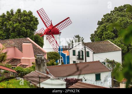 Portugal, Azores, Sao Miguel Island, Ajuda da Bretanha village. Restored corn windmill. Stock Photo