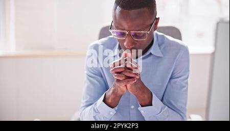 African American Man Praying Stock Photo