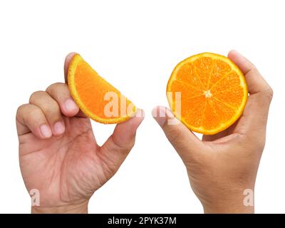 Hand holding slice of orange isolated on white background with clipping ...