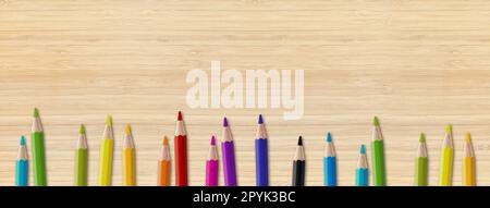 Colored pencil group isolated on wooden background. Panoramic banner background Stock Photo
