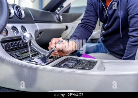 Man Cleaning Car Interior Car Detailing Valeting Concept Selective Focus  Stock Photo by ©nenadovicphoto@gmail.com 310865692