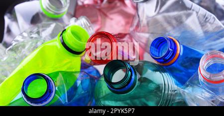 Empty colored carbonated drink bottles. Plastic waste Stock Photo