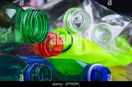Empty colored carbonated drink bottles. Plastic waste Stock Photo