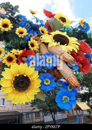Decoration of artificial flowers and vegetables Stock Photo