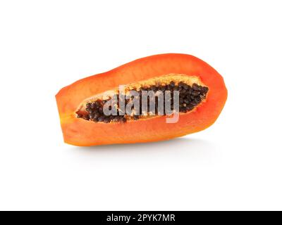 half of ripe papaya fruit with seeds isolated on white background Stock Photo