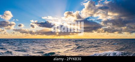 dreamlike sunset panorama on the open wide sea Stock Photo