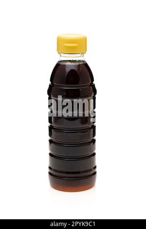 Plastic bottle of soy sauce on white background Stock Photo