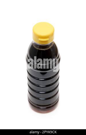 Plastic bottle of soy sauce on white background Stock Photo