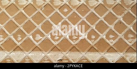 Reverse side of ceramic tiles. Detailed texture of tiles. Lattice surface closeup. Stock Photo