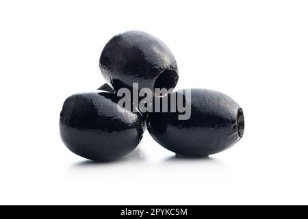 Pitted black olives isolated on white background. Stock Photo