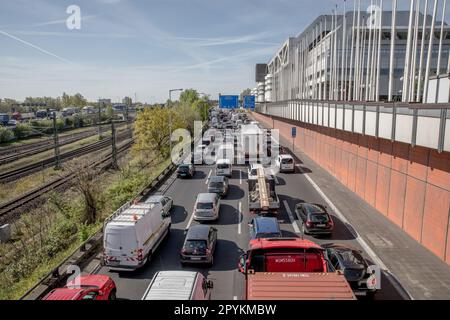 May 4, 2023, Berlin, Germany: On May 4, 2023, climate protesters blocked the A100 freeway in Berlin as part of a more significant protest to demand action on the climate crisis. The A100 is a major motorway that runs through the city, connecting the western and eastern parts of Berlin. The blockade caused significant traffic disruptions during the morning rush hour, with long delays reported on the freeway and surrounding roads. The A100 has been a contentious issue in Berlin for several years, with many residents and environmental groups opposing plans to expand the motorway. The climate prot Stock Photo